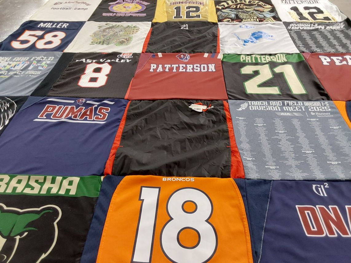 T-shirt quilt featuring pumas, broncos by Lori from AZ