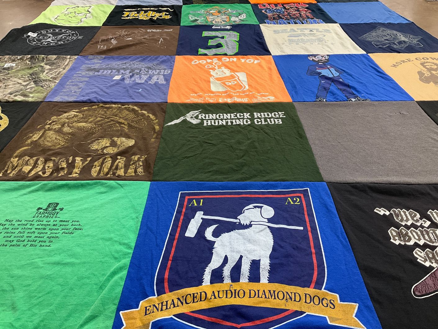 T-shirt quilt with hunting themes by Judith from NY