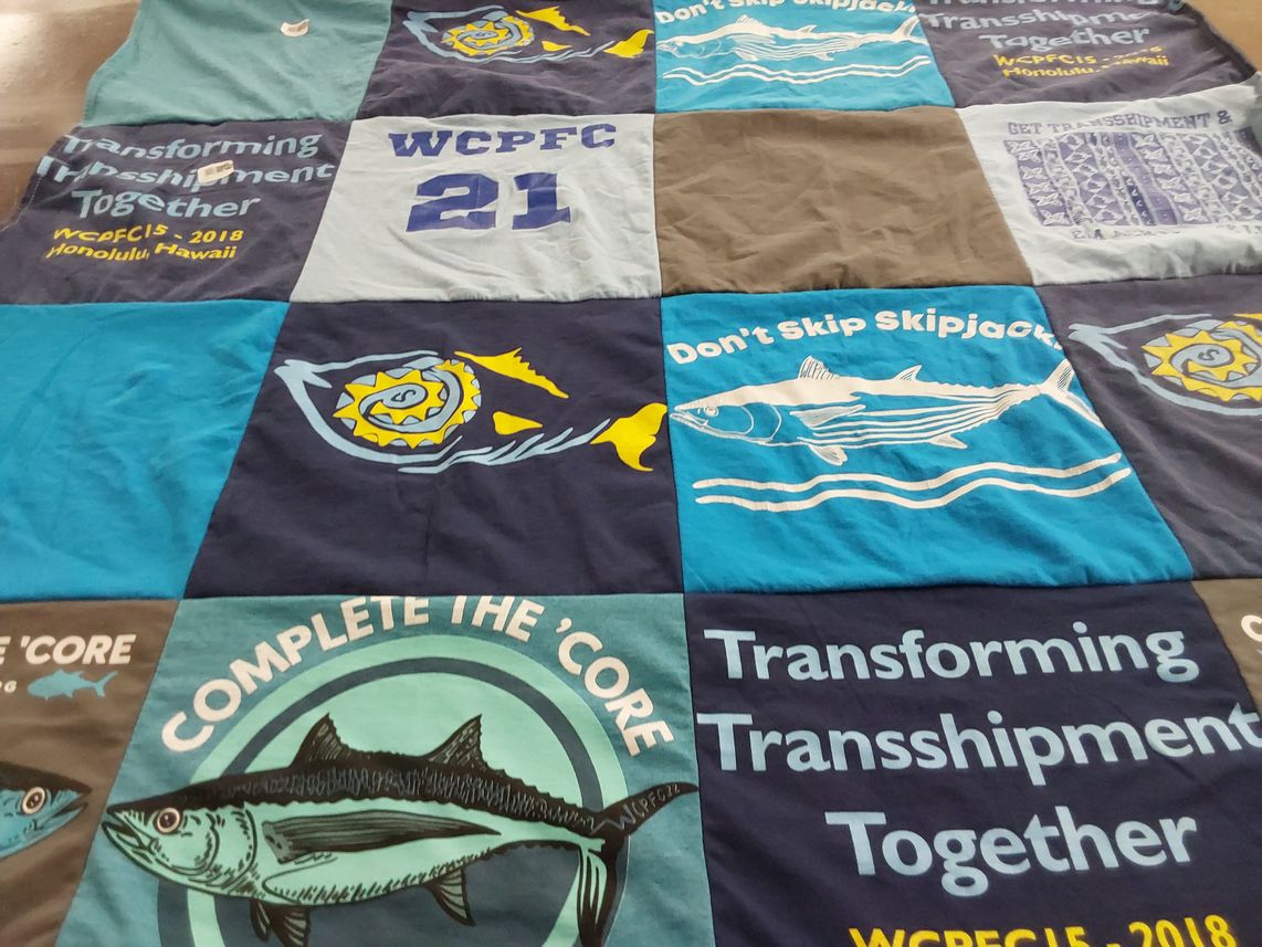 T-shirt quilt with fishing, marine conservation themes by Esther from VA