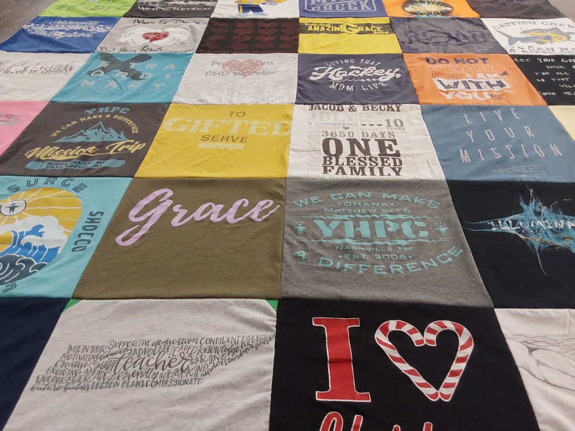T-shirt quilt with community, service themes by Rebecca from TN