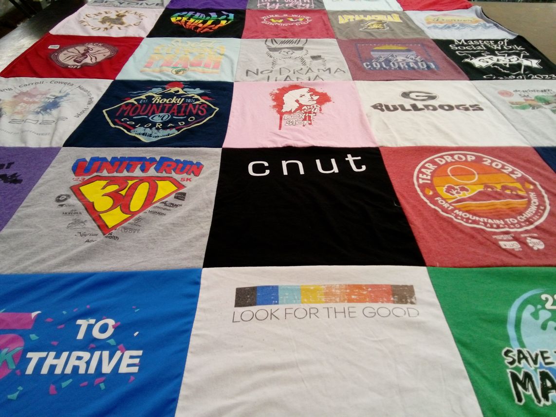 T-shirt quilt with running, fitness themes by Ellie from GA