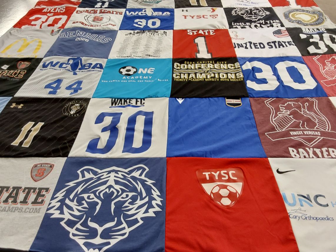 T-shirt quilt featuring wake fc by Kathryn from NC