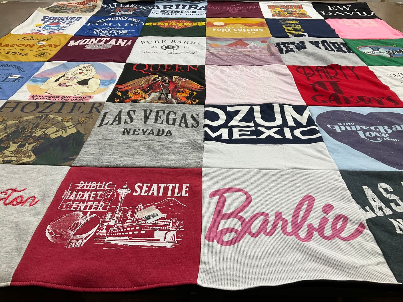 T-shirt quilt with music, travel themes by Erica from MA