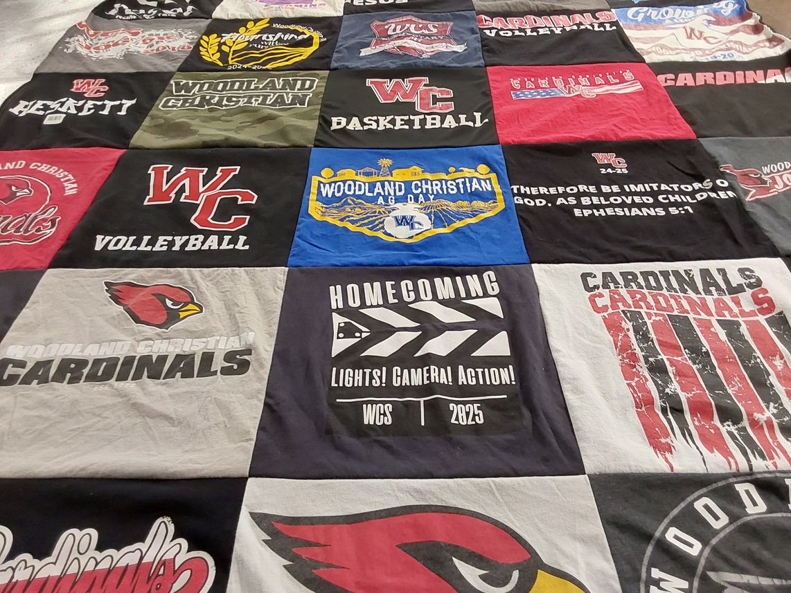 T-shirt quilt featuring woodland christian cardinals by Meredith from CA