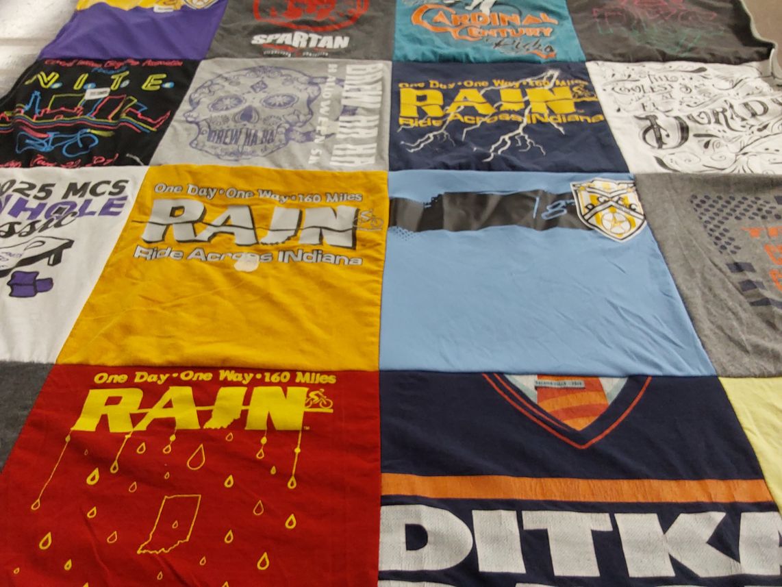 T-shirt quilt with cycling, charity rides themes by Zach from IN