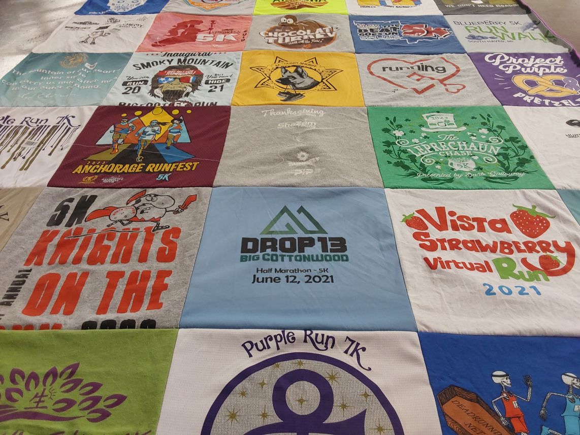 T-shirt quilt with running themes by Tina from IL