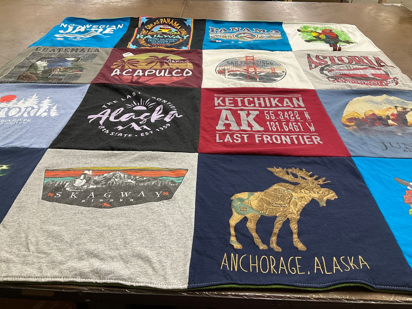 T-shirt quilt with travel, geography themes by CHARLES from CA