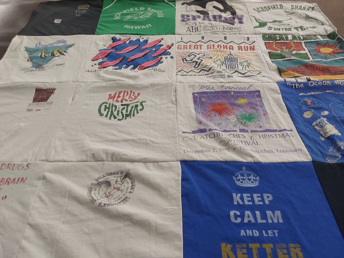 T-shirt quilt featuring sharks swim team by Terrance from FL