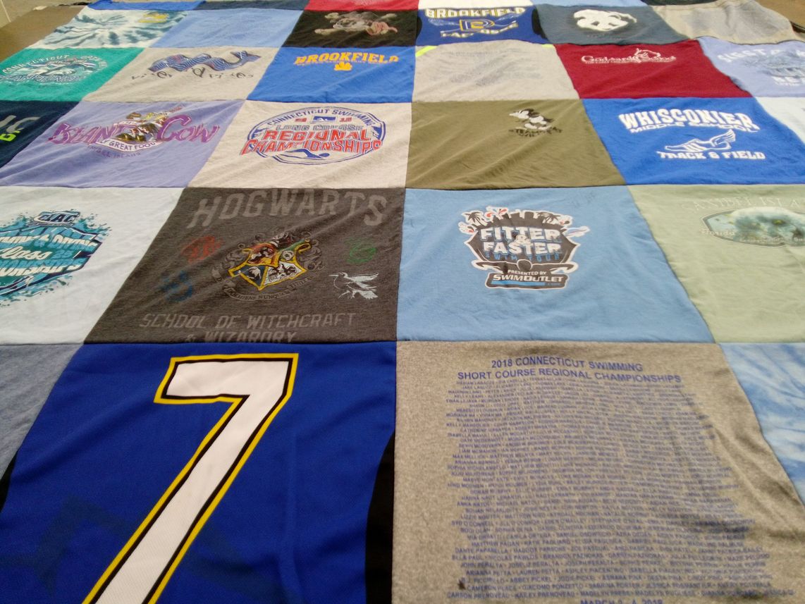 T-shirt quilt featuring whiskoner middle track and field by Michelle from CT