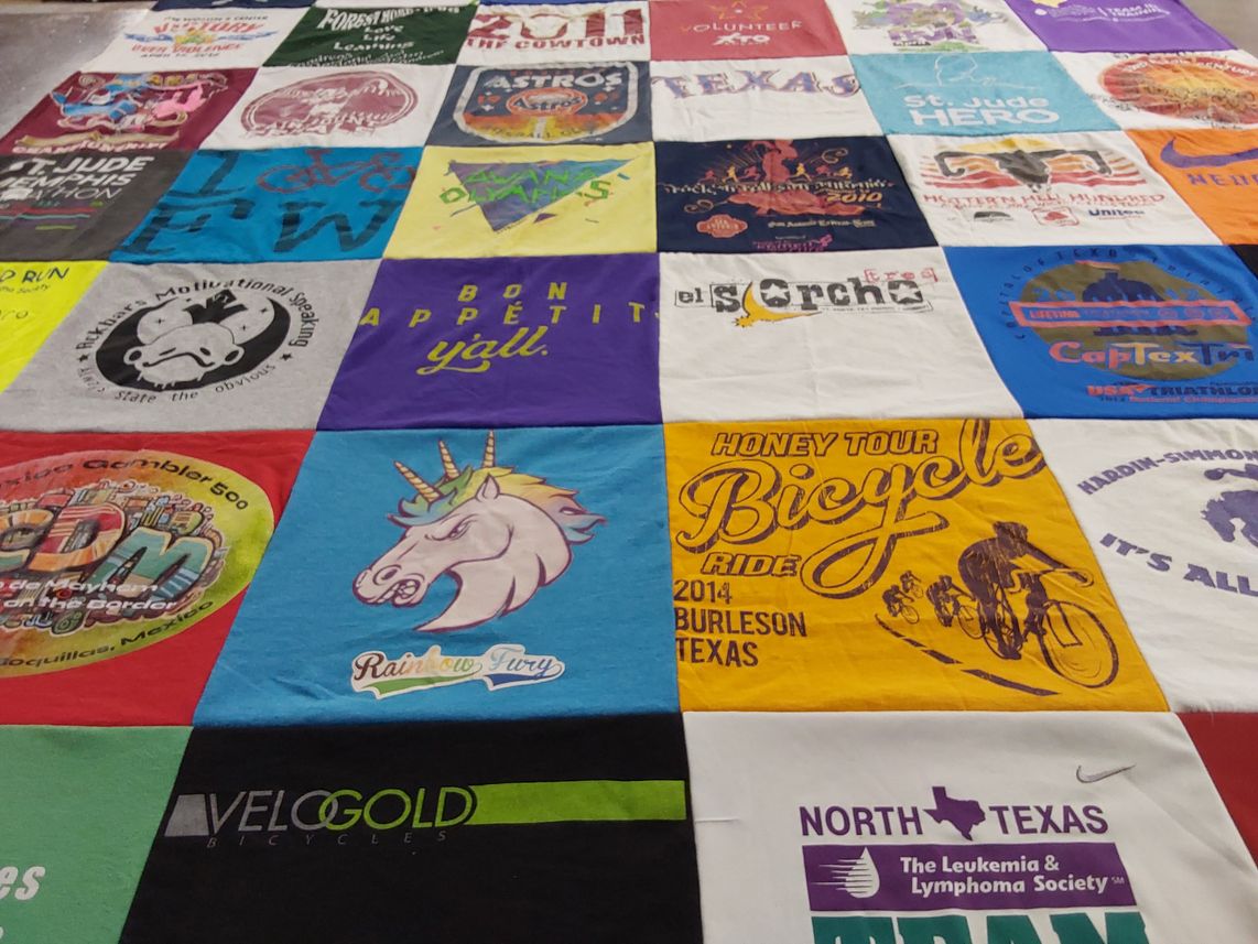 T-shirt quilt with cycling, charity themes by Becky from TX