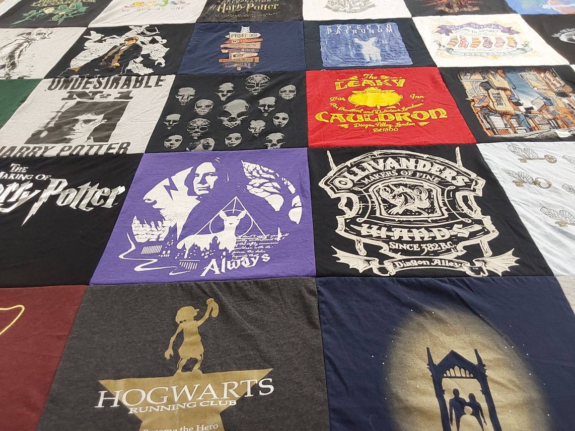 T-shirt quilt with fantasy, fiction themes by Anita from PA