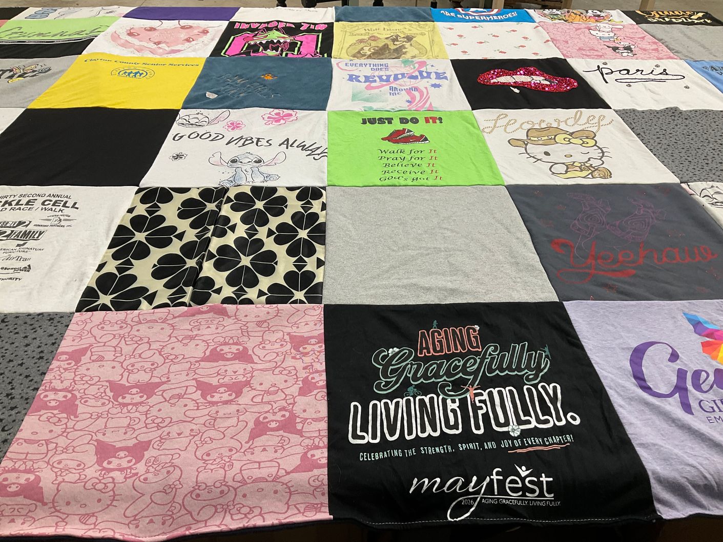 T-shirt quilt with fundraising, community support themes by Angelita from GA
