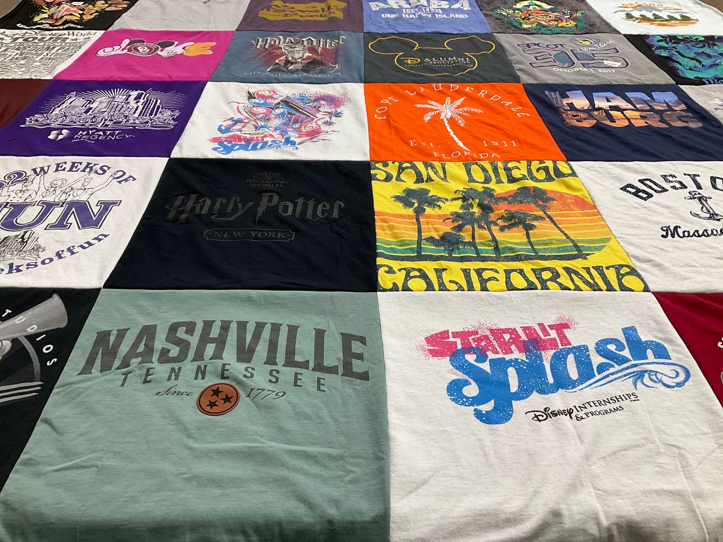 T-shirt quilt with disney, travel themes by Kristen from FL