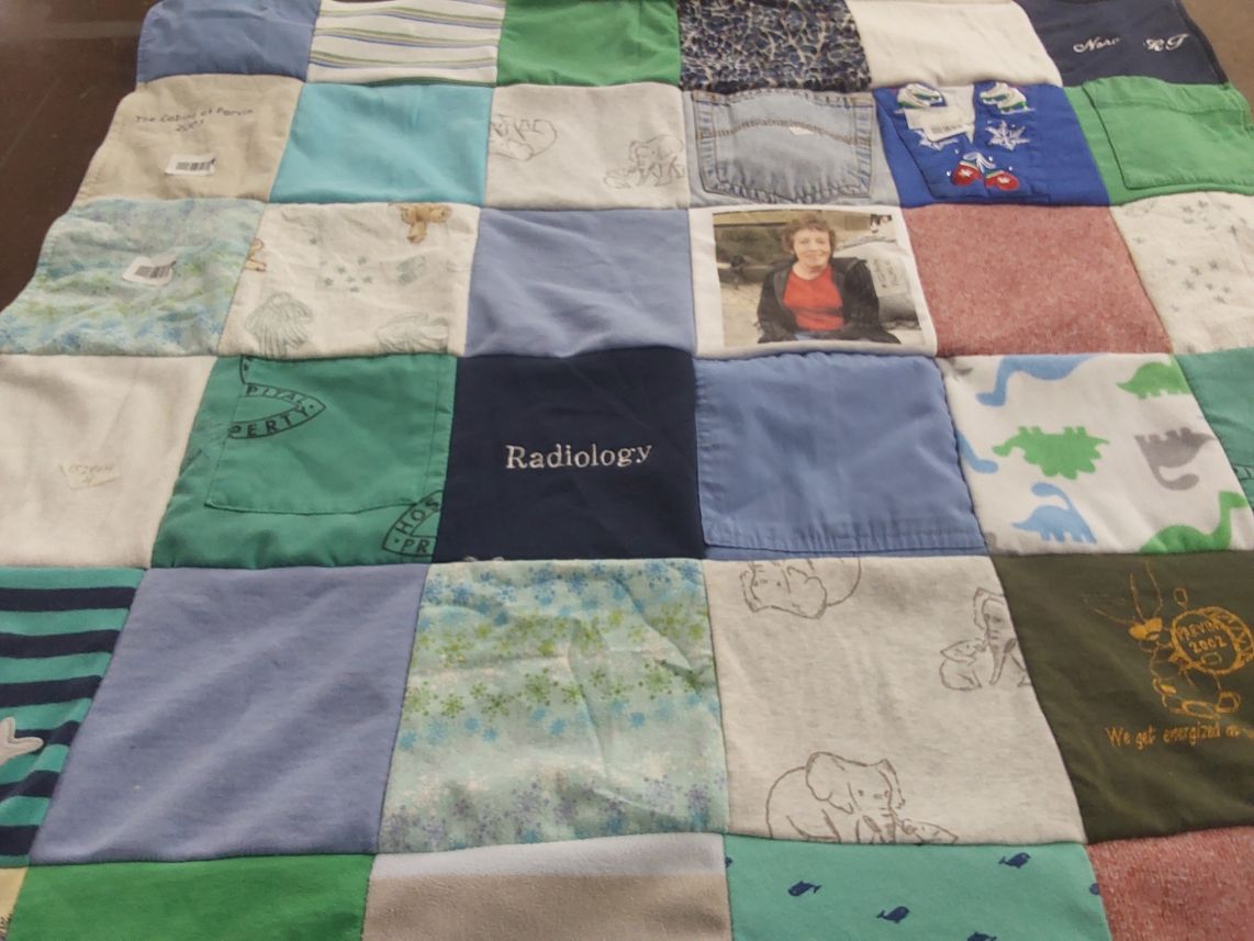 T-shirt quilt with medicine, healthcare themes by Rachel from MA