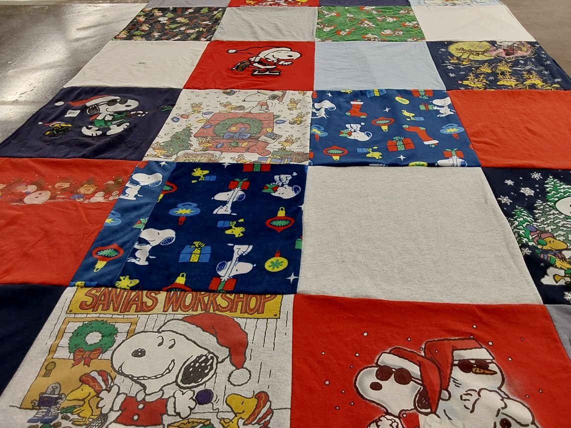 T-shirt quilt with holiday, christmas themes by Deborah from NY