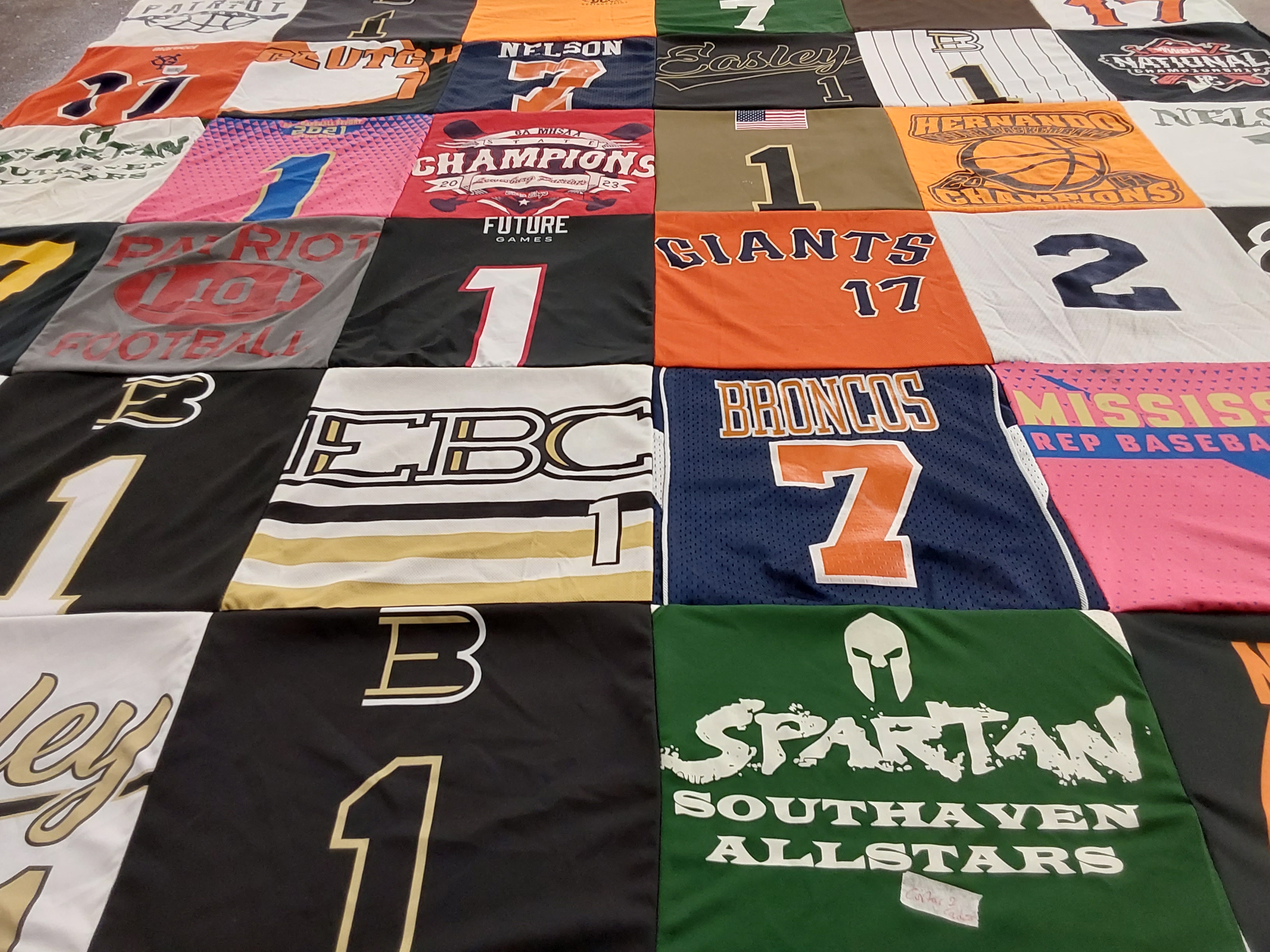 T-shirt quilt featuring broncos, giants by Jenn from MS