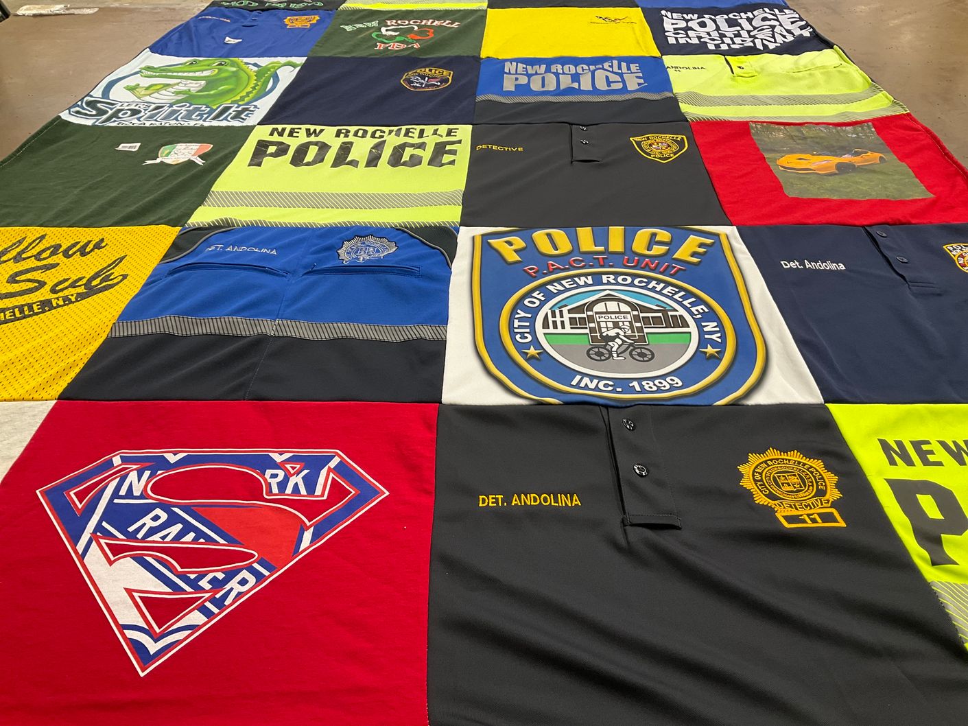 T-shirt quilt with law enforcement, community service themes by Raymond from NY