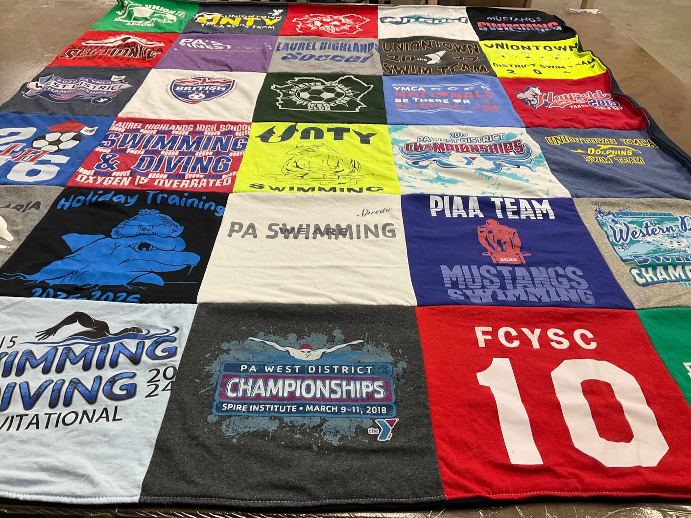 T-shirt quilt featuring uniontown swim team, mustangs swimming by Teresa from PA
