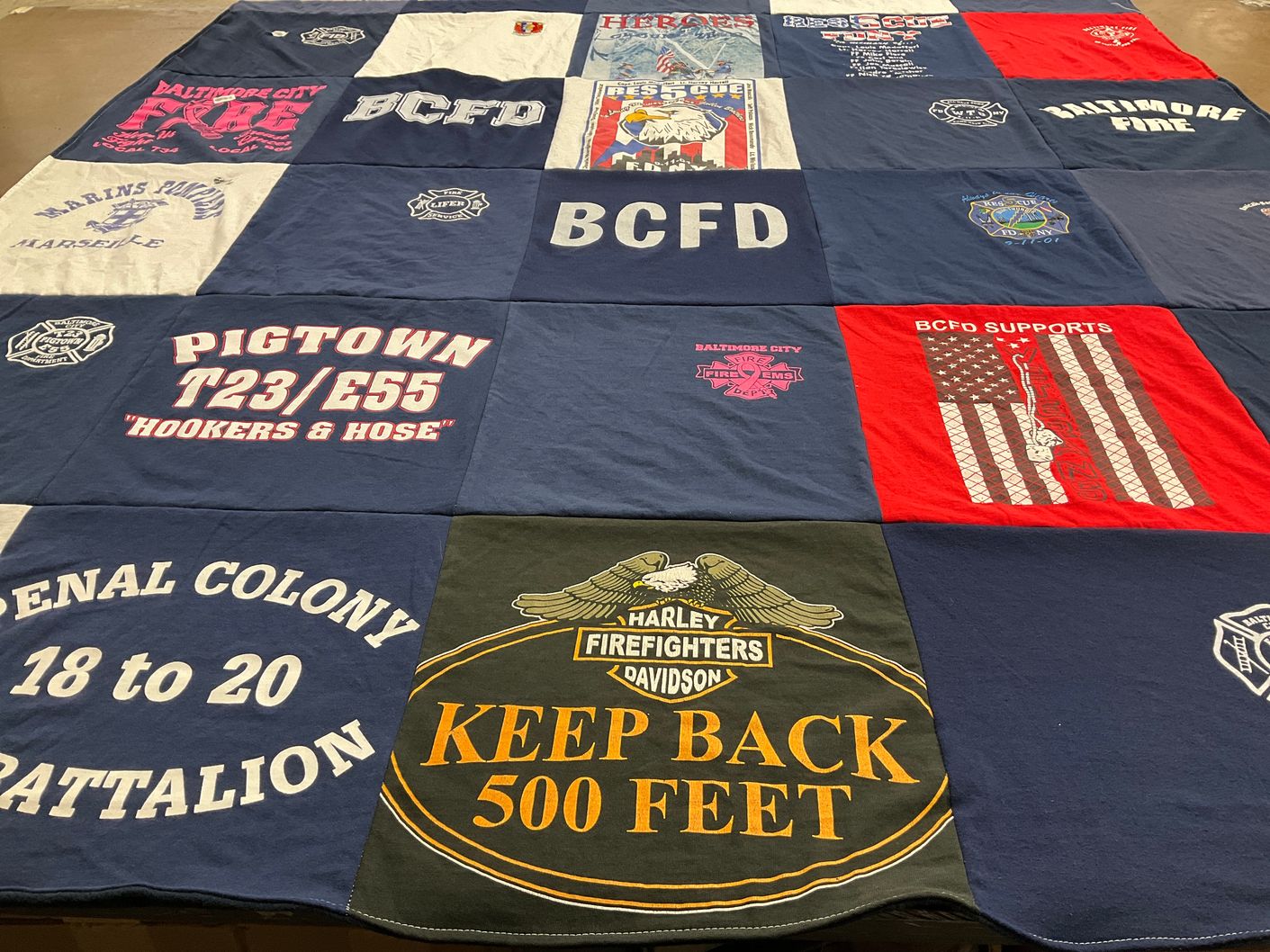 T-shirt quilt with firefighting, emergency services themes by Susan from PA