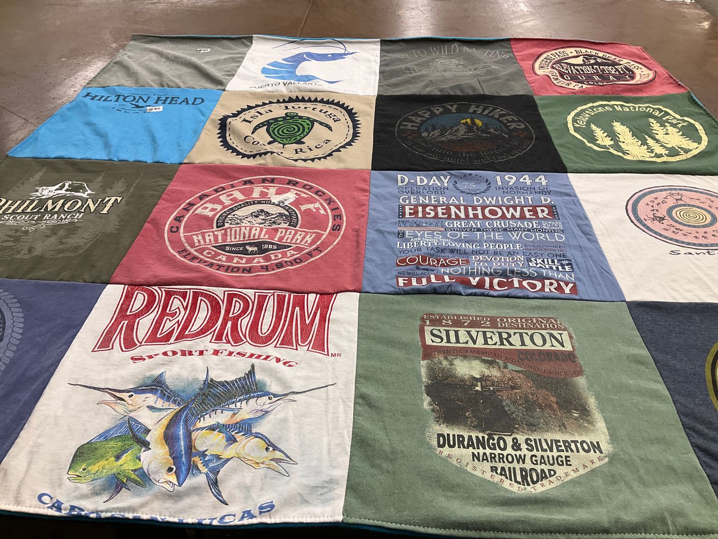 T-shirt quilt with fishing, hiking themes by Julie from TX