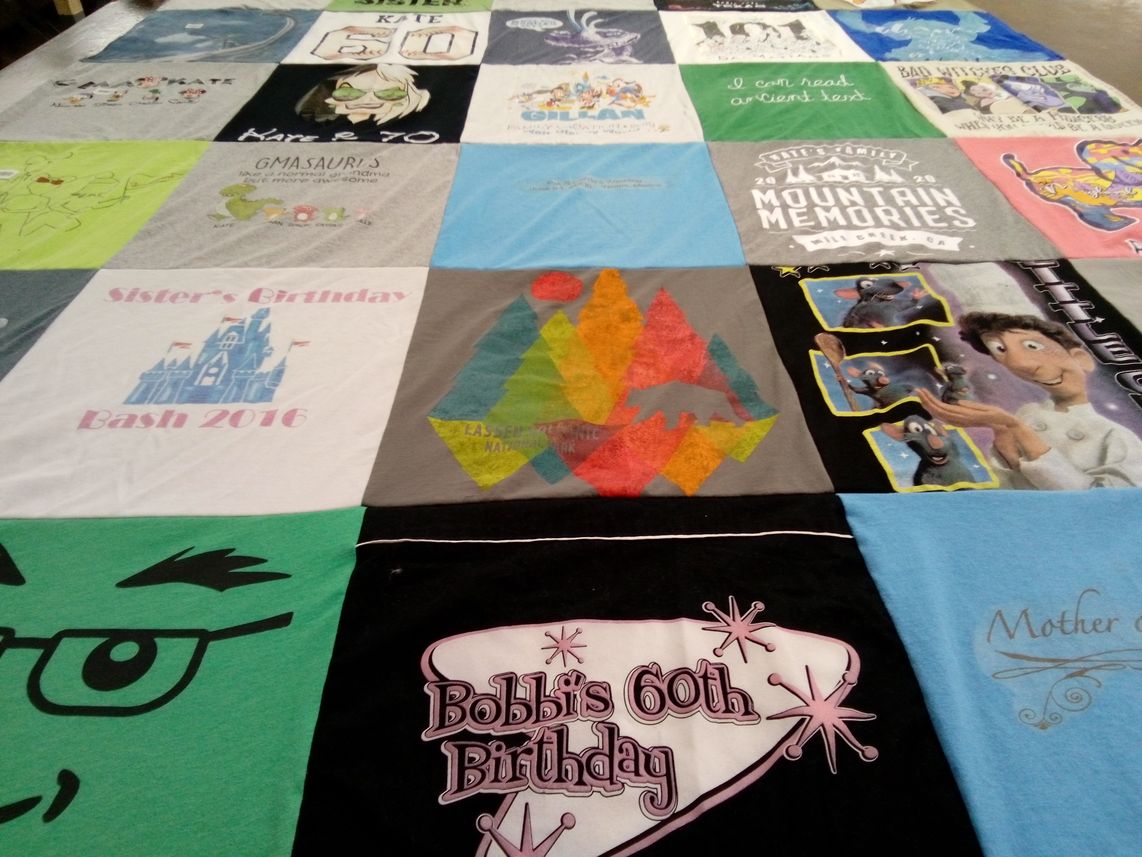 T-shirt quilt with birthdays, family themes by Katherine from KS