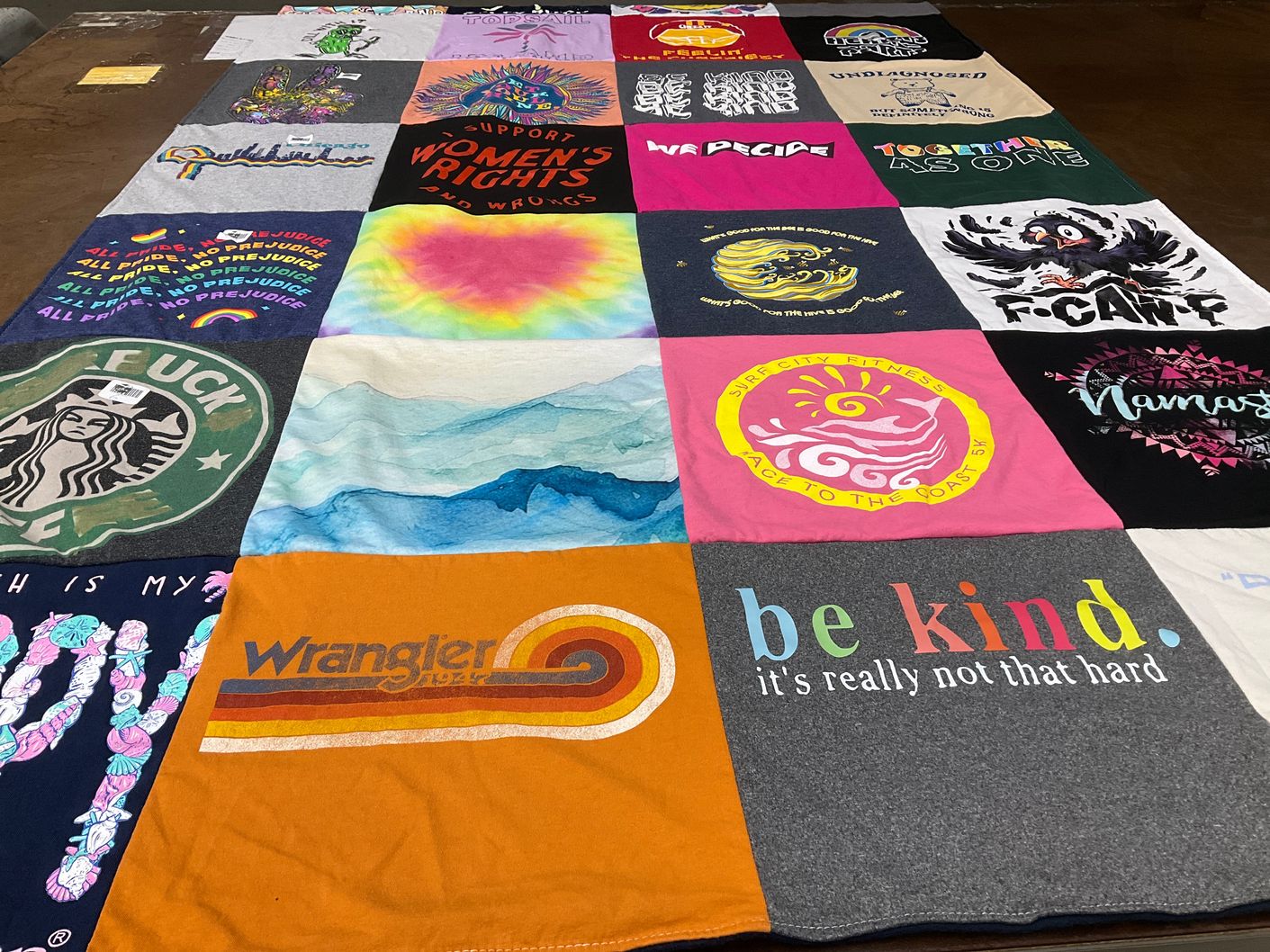 T-shirt quilt with women's rights, pride themes by Stacey from NC