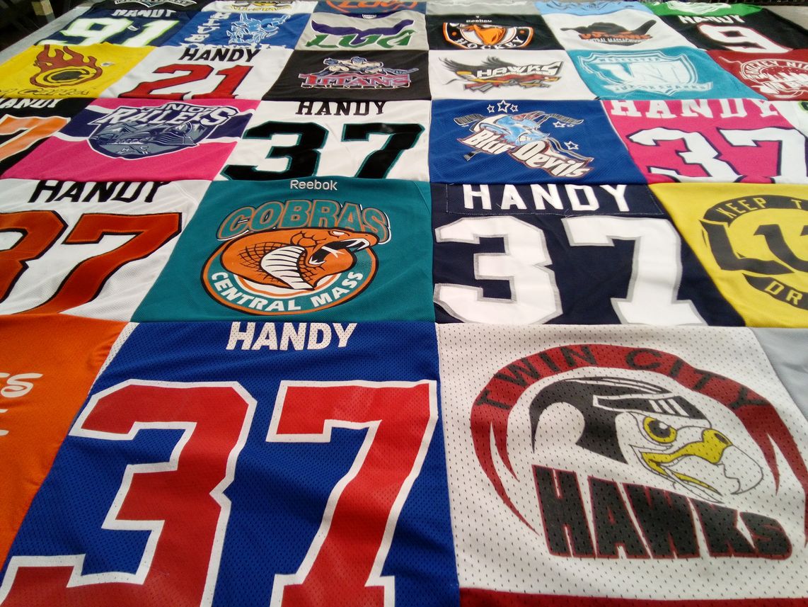 T-shirt quilt featuring central mass cobras, twin city hawks by Maria from MA