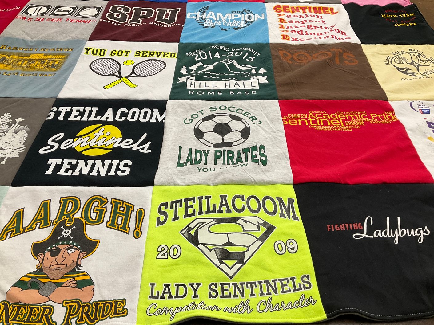 T-shirt quilt featuring lady pirates, lady sentinels by Jen from WA