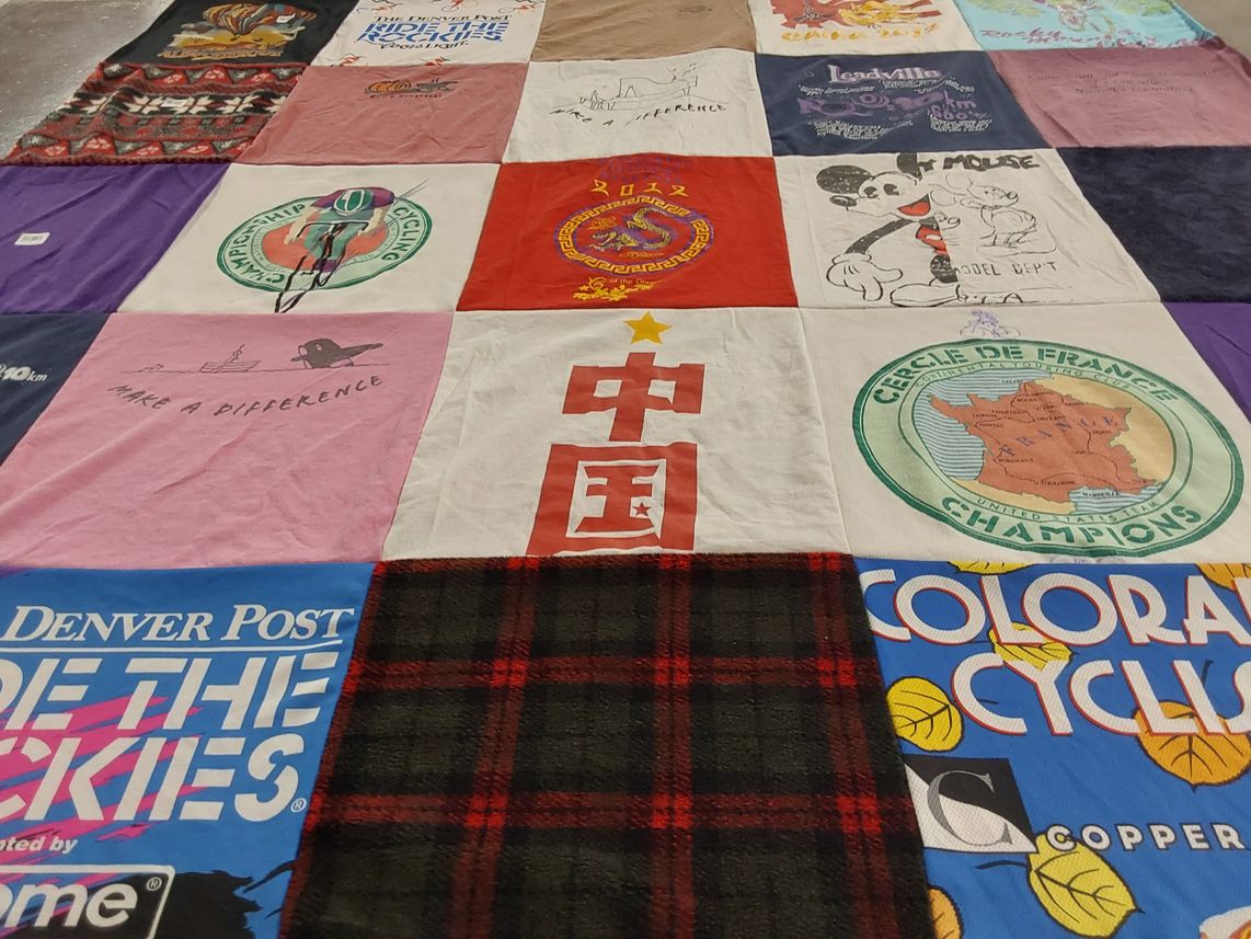 T-shirt quilt with cycling themes by Kami from WA