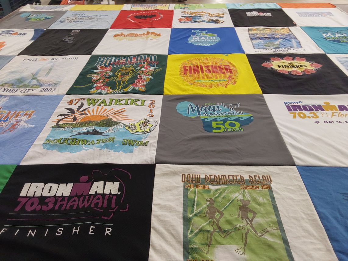 T-shirt quilt with running, swimming themes by Steven from HI