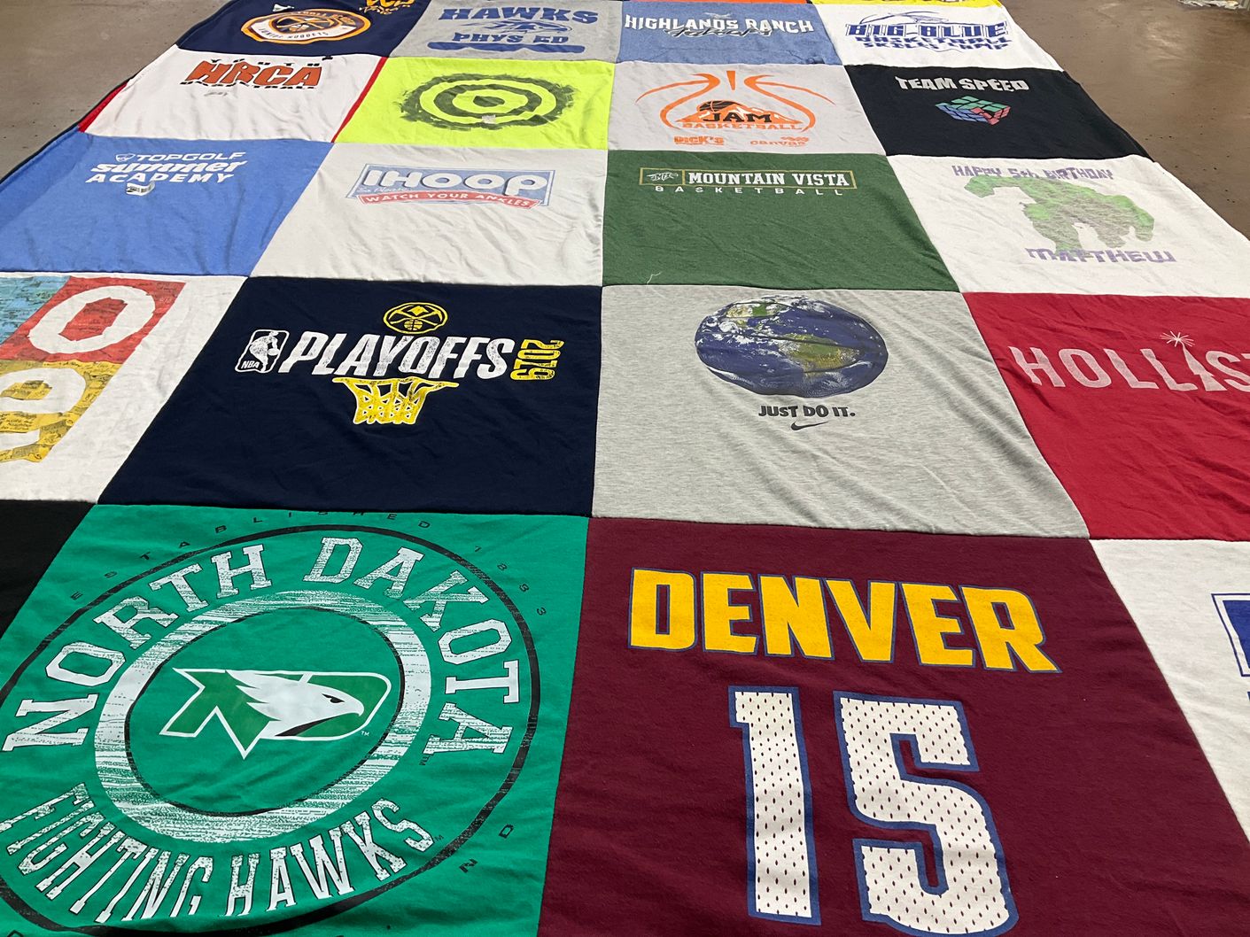 T-shirt quilt featuring denver nuggets, north dakota fighting hawks by Lisa from CO
