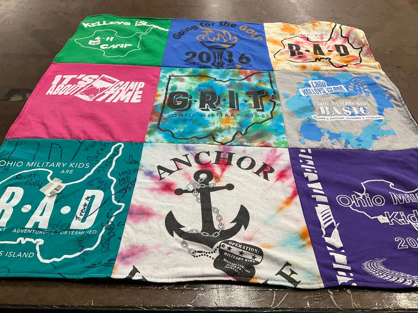 T-shirt quilt with camping, military themes by Heather from OH