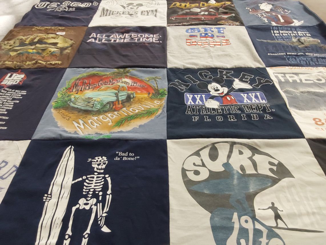T-shirt quilt with surfing, fitness themes by Cheryl from FL