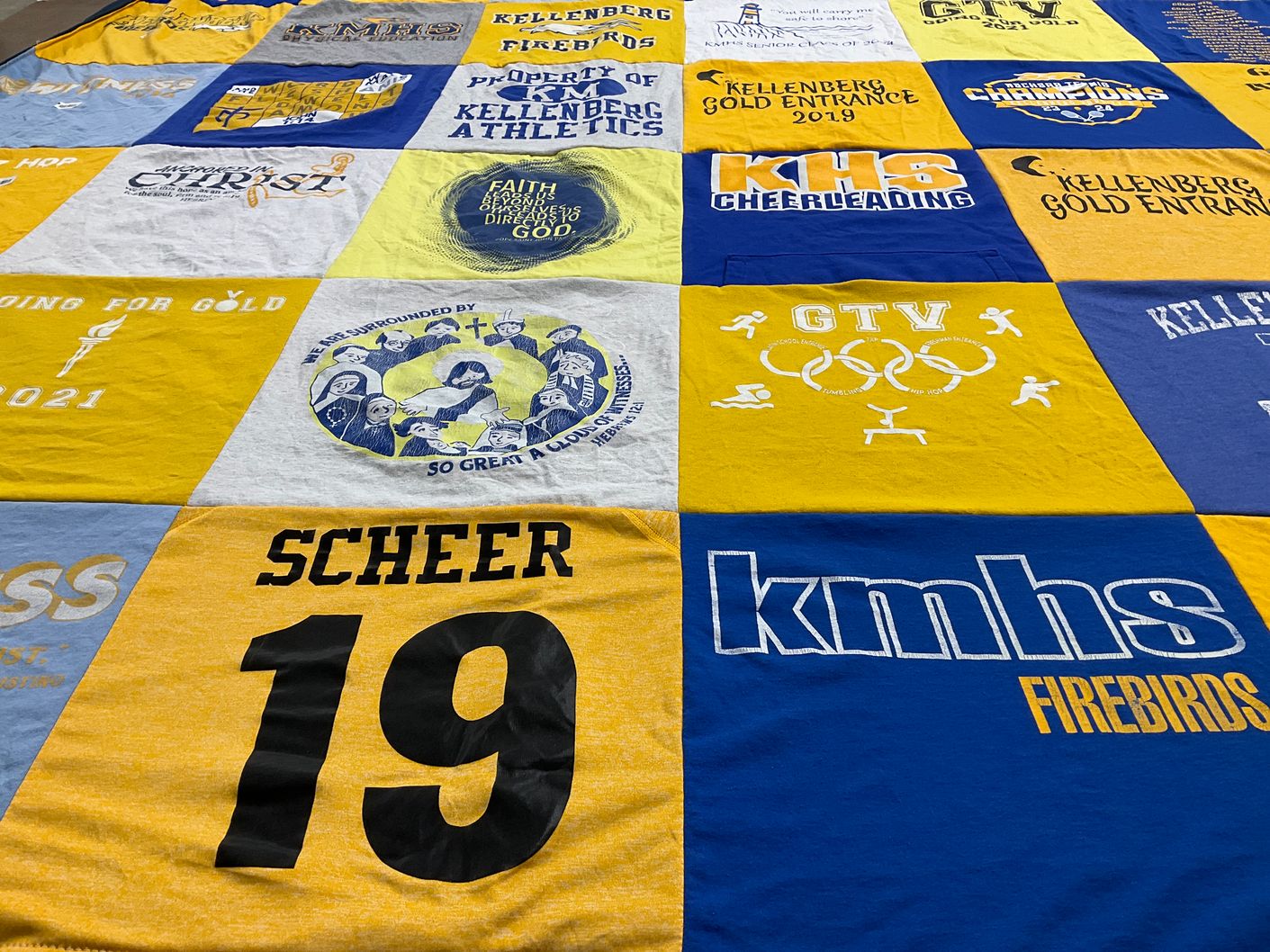 T-shirt quilt featuring kellenberg memorial high school firebirds by Fara from NY