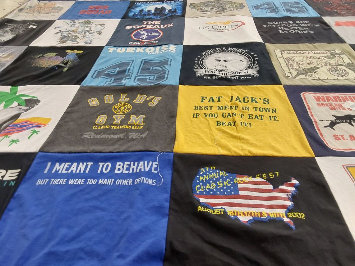 T-shirt quilt with fitness, food themes by Peter from TN