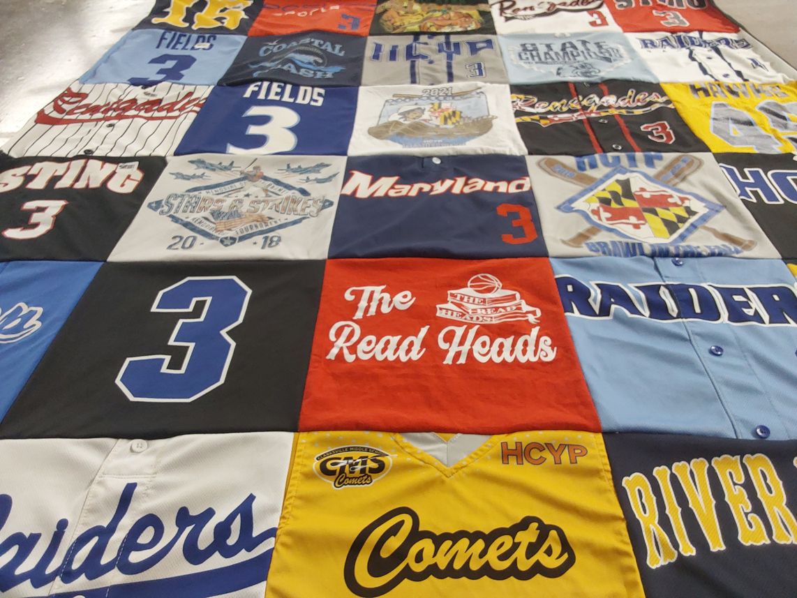 T-shirt quilt featuring comets, raiders by Rebecca from MD