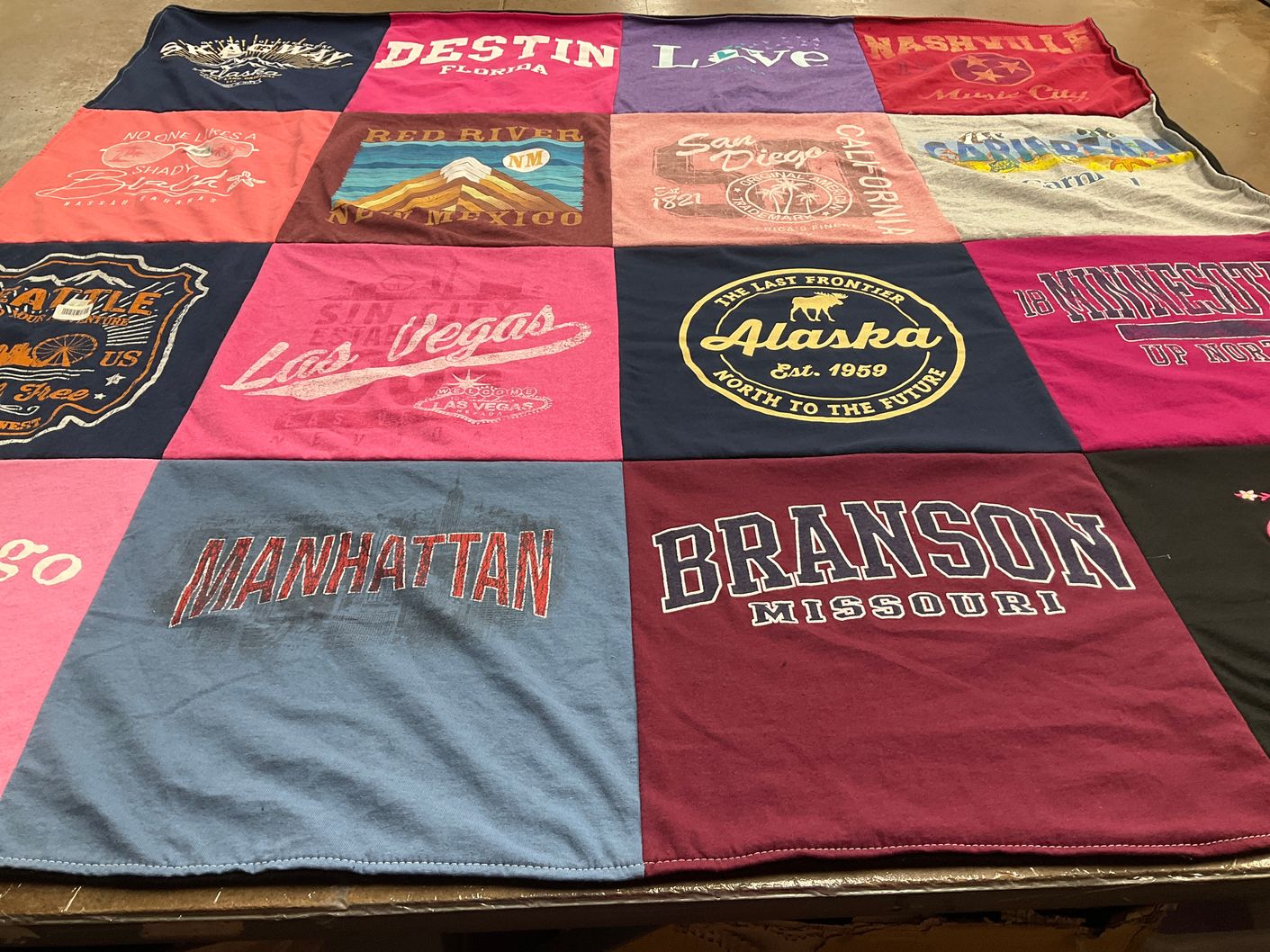 T-shirt quilt with travel, tourism themes by Deborah from TX