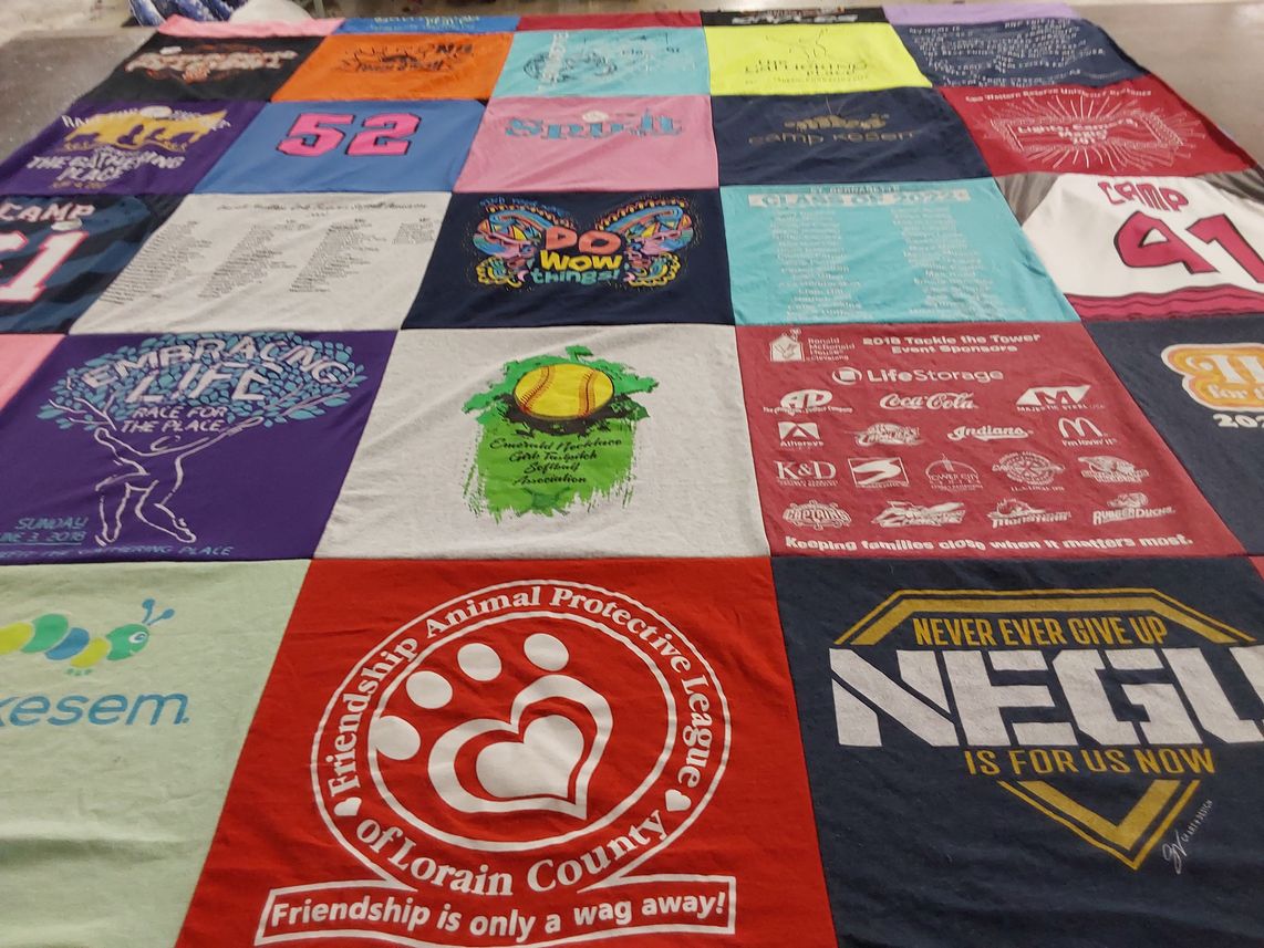 T-shirt quilt with camping, animal welfare themes by Colette from OH