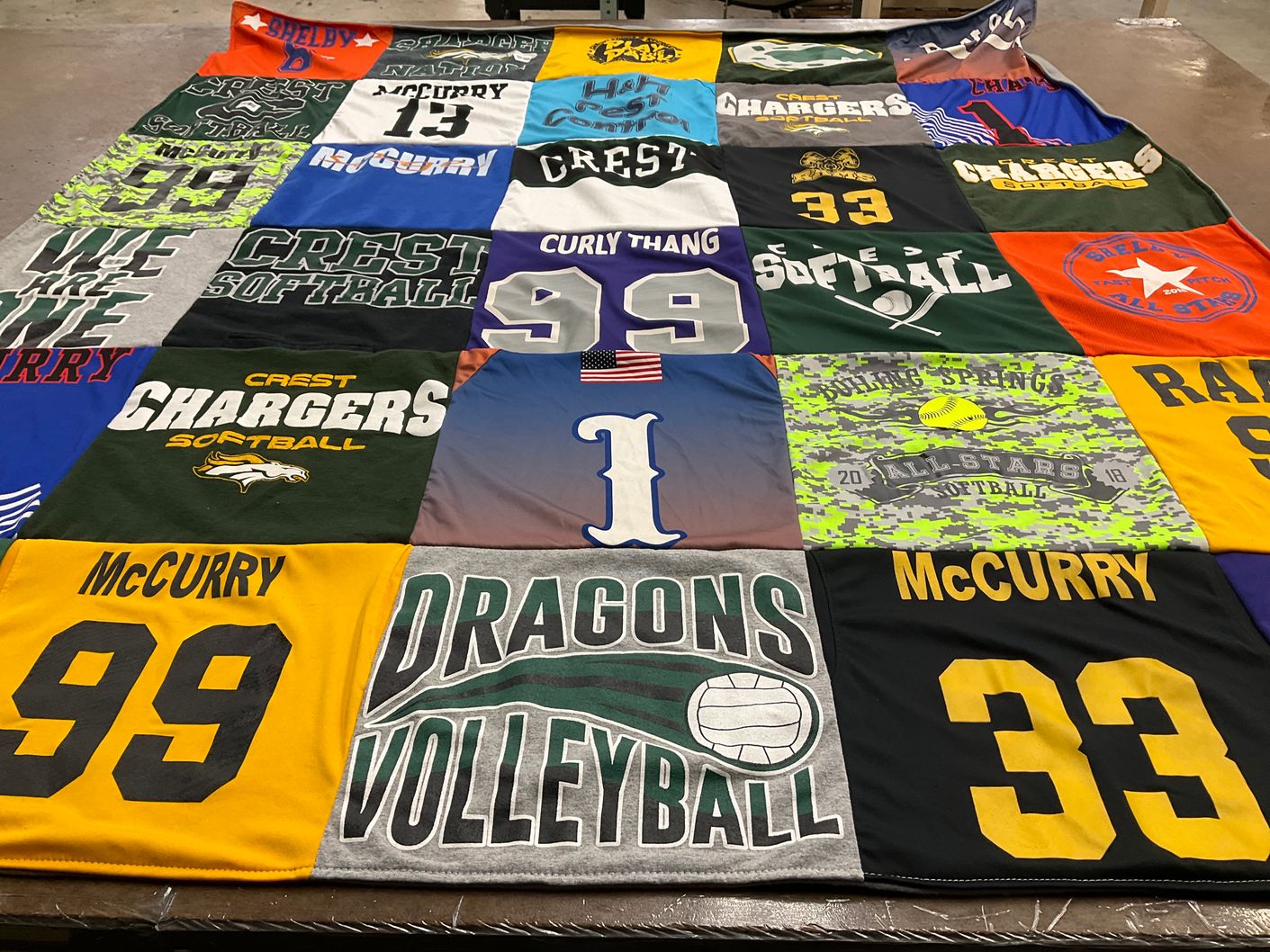 T-shirt quilt featuring crest chargers softball, dragons volleyball by Amy from NC