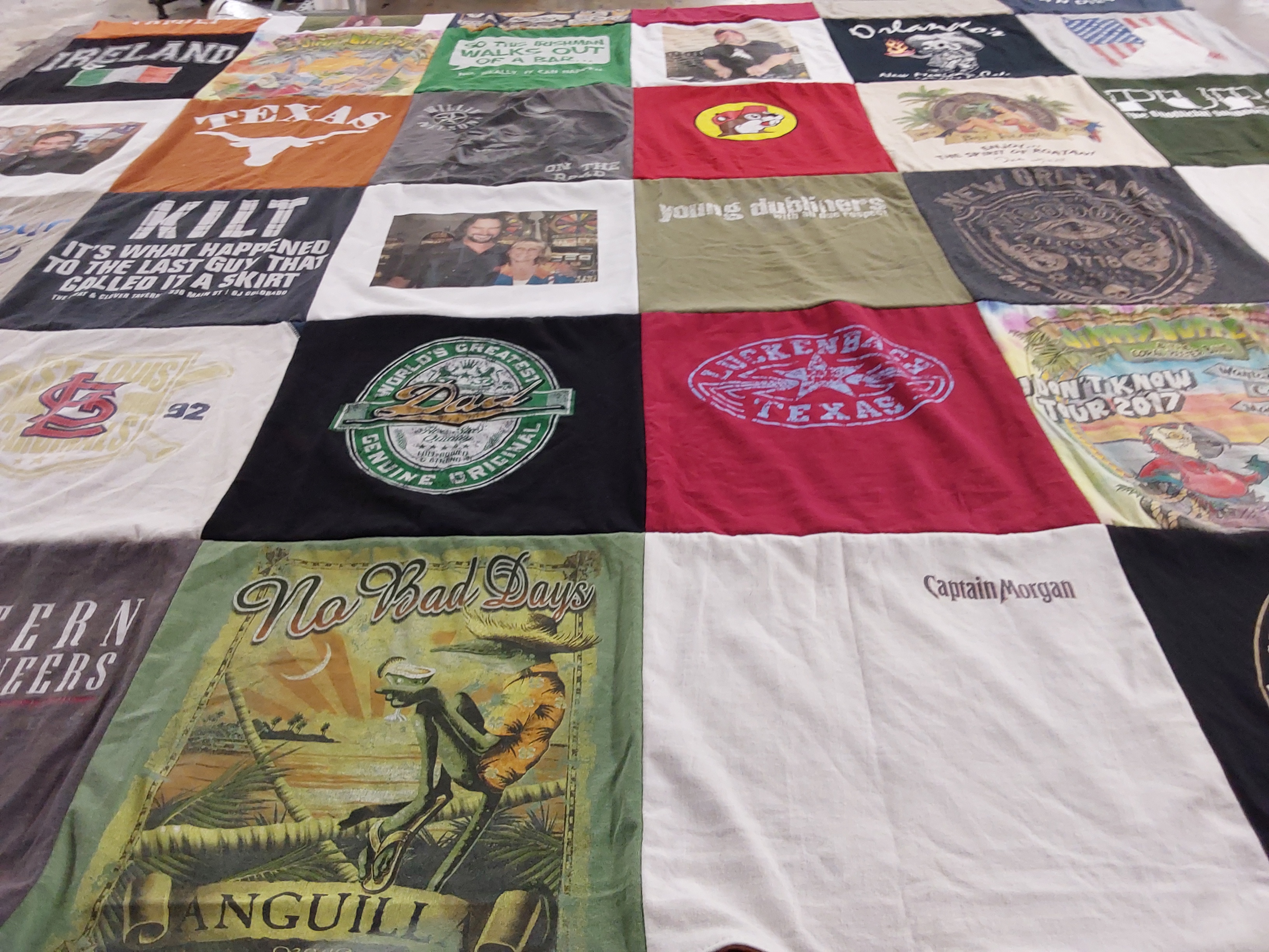 T-shirt quilt with renaissance festivals, beer themes by Sandra from CO