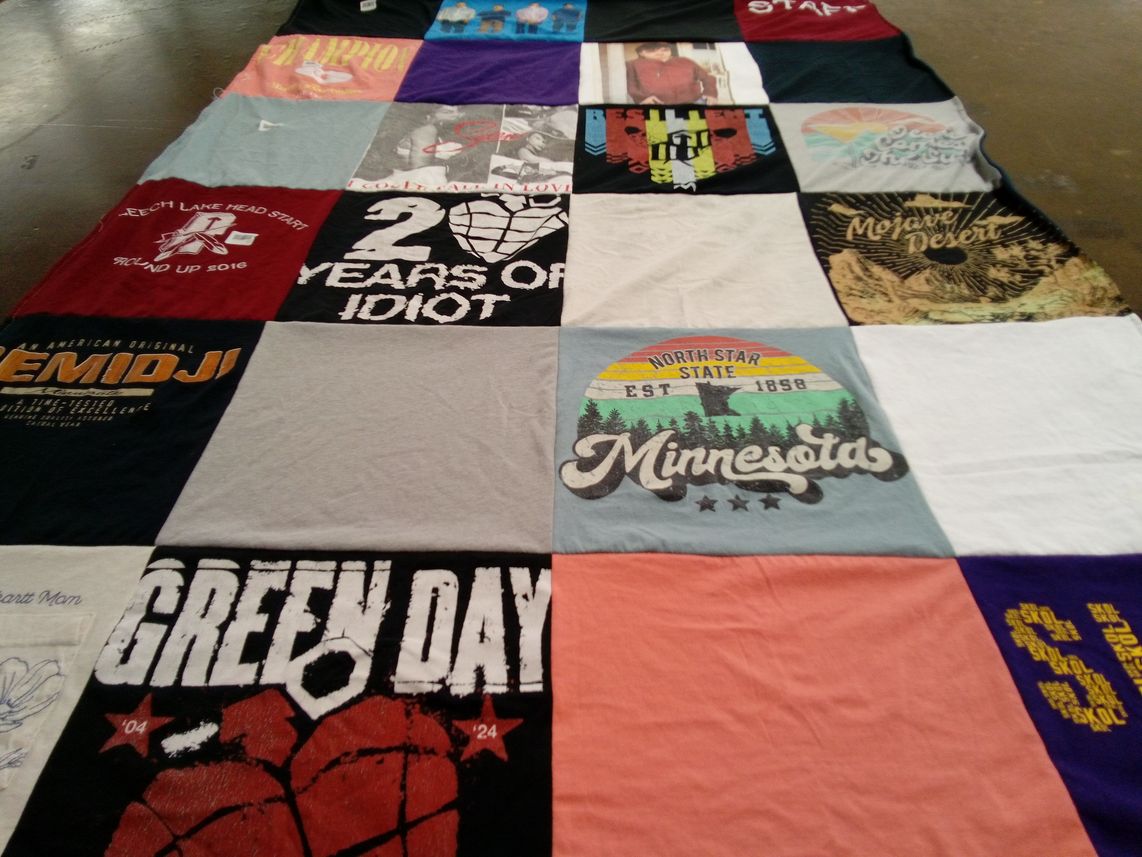 T-shirt quilt with music, local culture themes by sandy from MN