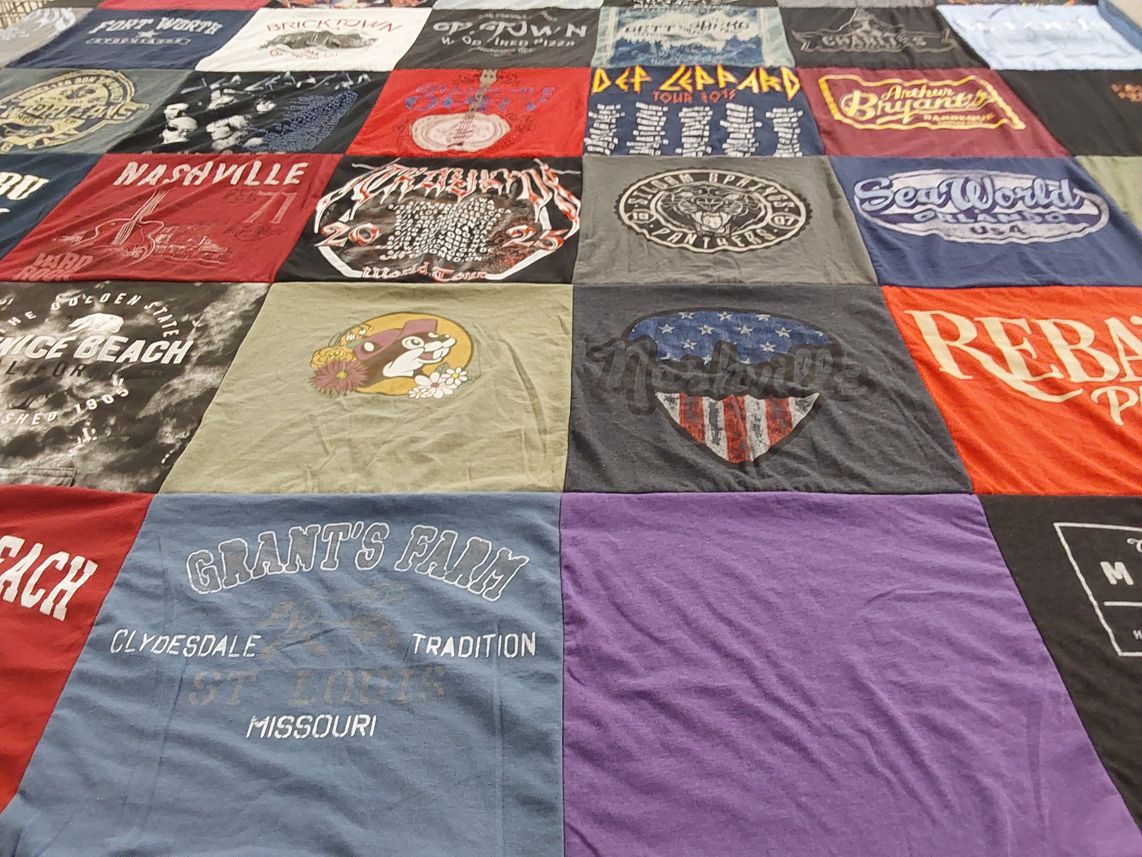 T-shirt quilt with music, travel themes by Diann from AR