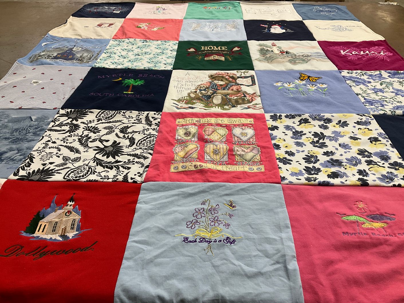 T-shirt quilt with travel, embroidery themes by Lynda from OH