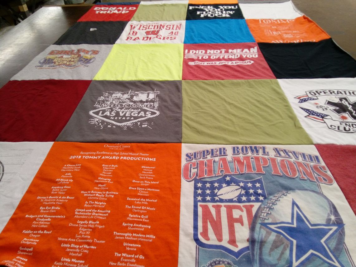 T-shirt quilt with sports, politics themes by robin from WI