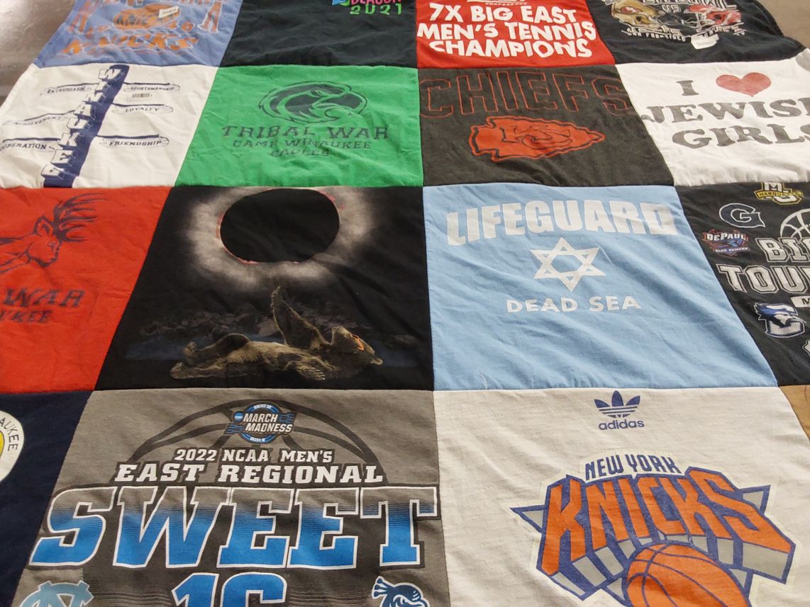 T-shirt quilt featuring new york knicks, university of north carolina by Sari from NY