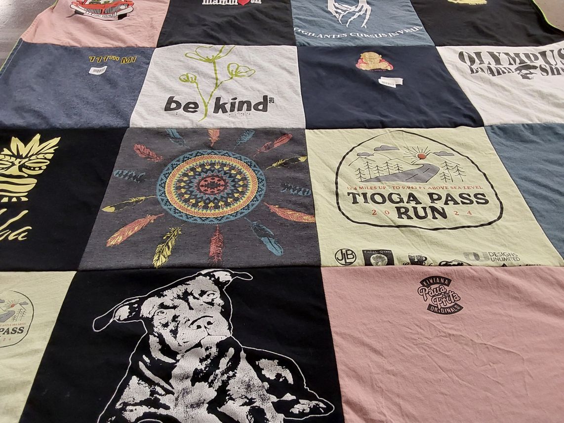 T-shirt quilt with running, outdoors themes by Katherine from NV