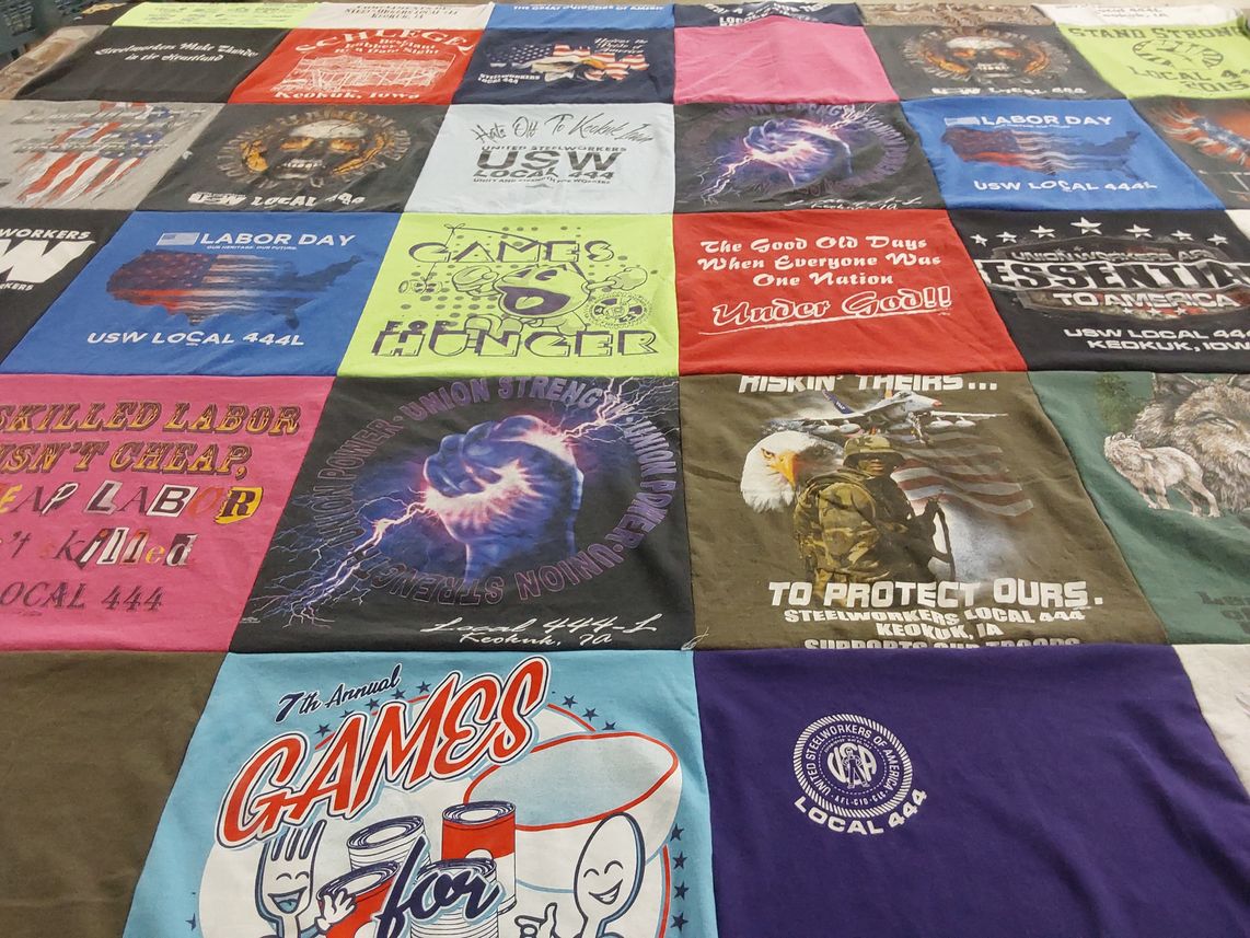 T-shirt quilt with union work, labor rights themes by Paula from IA