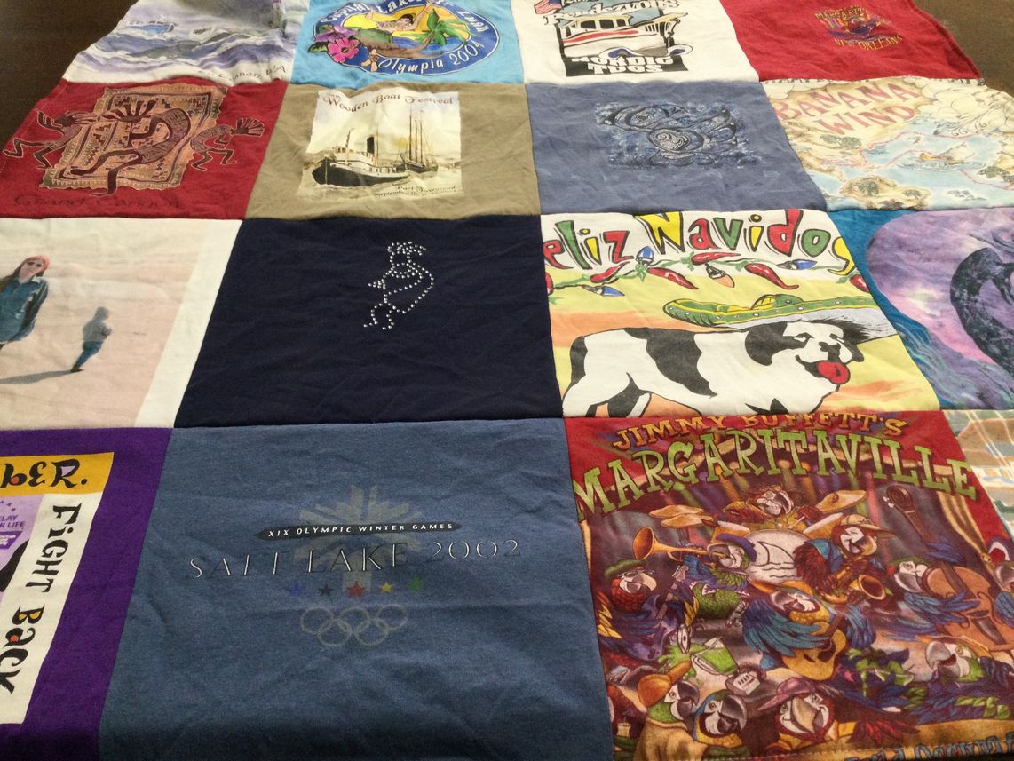 T-shirt quilt with travel, events themes by Heather from WA