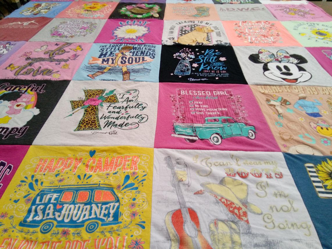 T-shirt quilt with camping, spirituality themes by Cara from KS