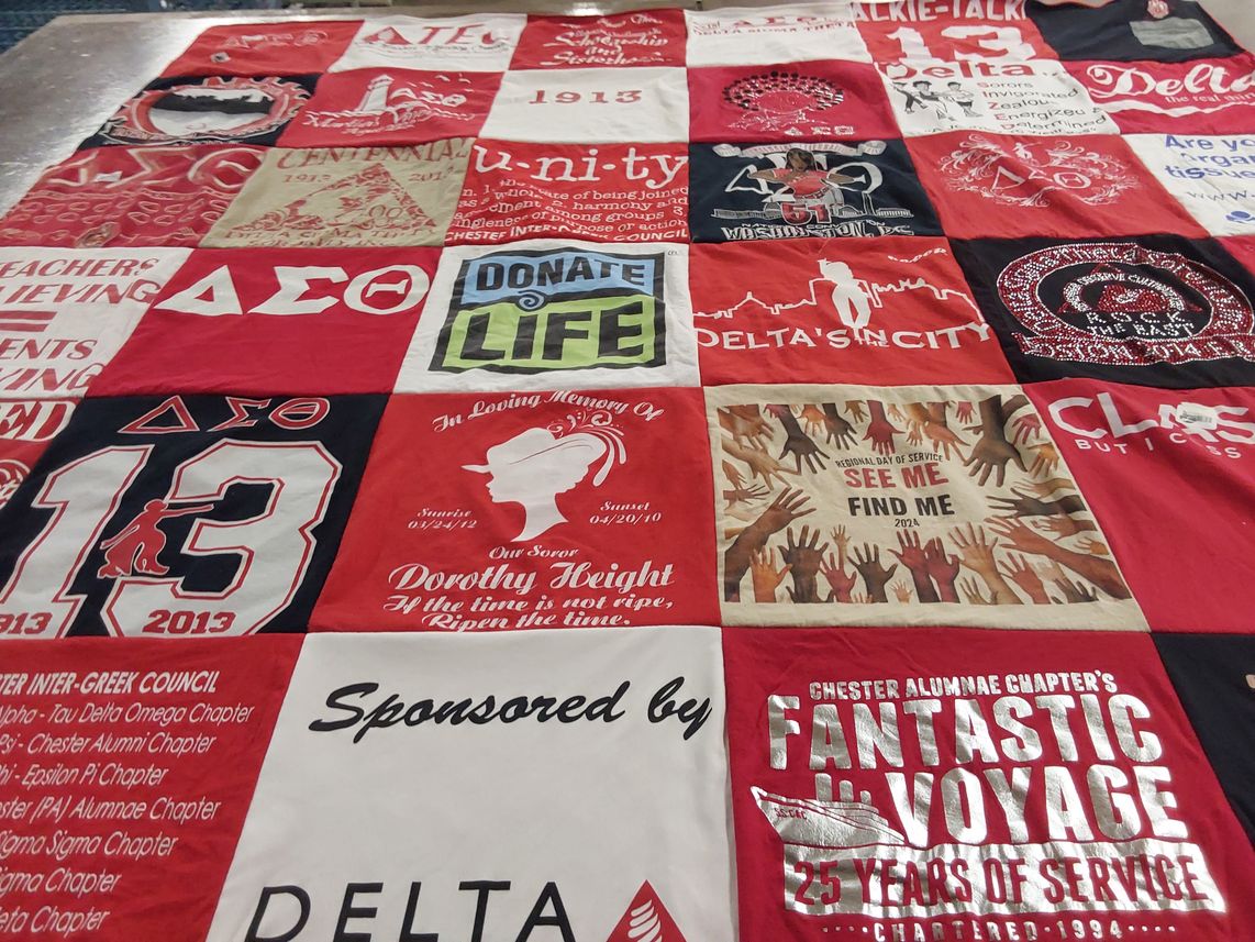 T-shirt quilt with community service, support themes by Angela from PA